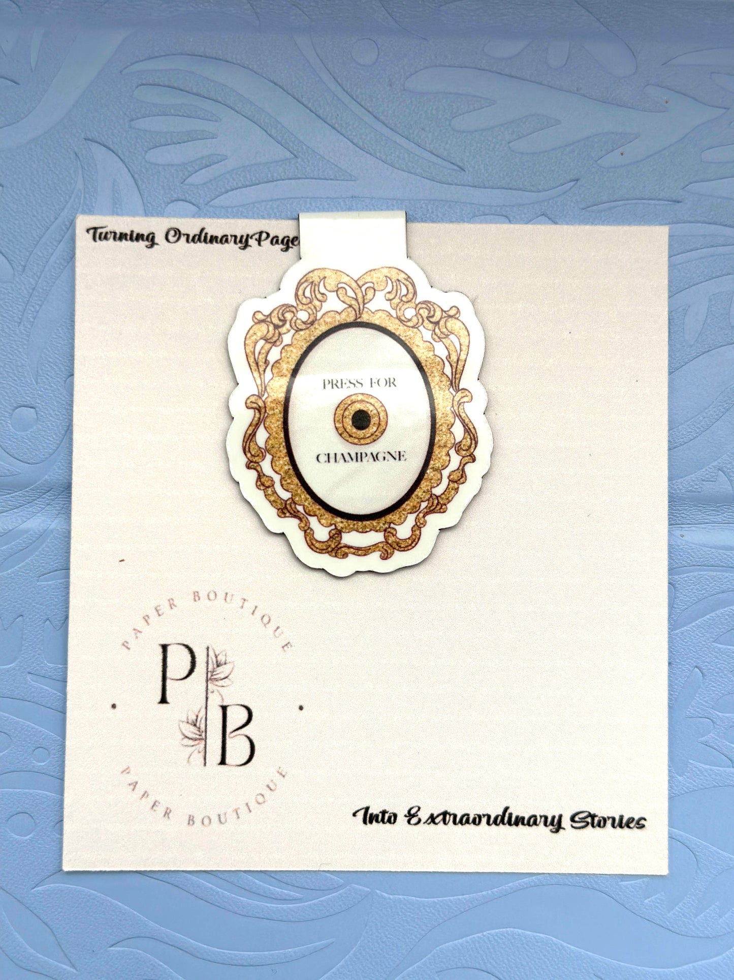 PRESS FOR CHAMPAGNE MAGNETIC BOOKMARK